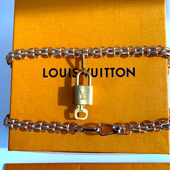 Authentic Louis Vuitton Lock and Key Set on a Chain. - Picture 2 of 10